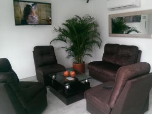 A seating area at Hotel Septima Avenida