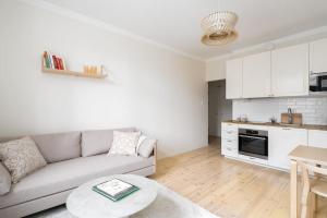 Kuchyň nebo kuchyňský kout v ubytování Apartment in Kamppi