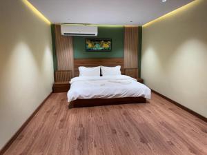 Letto o letti in una camera di Al Bayan Palms