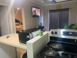 TV a/nebo společenská místnost v ubytování Condominio Genesis