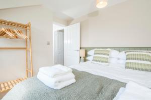 Postel nebo postele na pokoji v ubytování Bwthyn Clyd