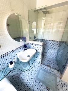 Bany a Beach front 9 min to airport DosLocosDeViaje