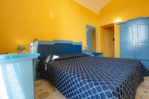 Postel nebo postele na pokoji v ubytování Hotel Savoia + 37 fotografií