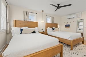 Ένα ή περισσότερα κρεβάτια σε δωμάτιο στο Surrey Beach House +57 φωτογραφίες