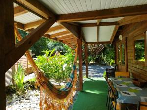 Zahrada ubytování Insolite Arawakane Gîtes du Manial chalet