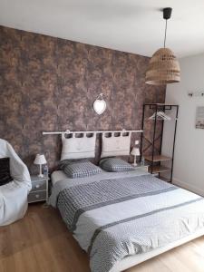 Postel nebo postele na pokoji v ubytování Chambre d'Hôtes Ty Men