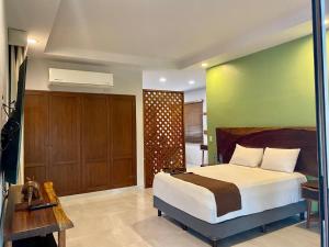 Voodi või voodid majutusasutuse Xuux Peek by Tecnohotel toas