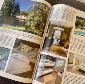 a magazine page of a bedroom in a house at LES 15 CHENES Chambres d hôtes, parc arboré de 5000 m2 à 20KM du PUYDUFOU Une suite familiale et 3 chambres doubles in Saint-Mesmin