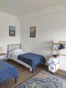 Postel nebo postele na pokoji v ubytování Family Нotel Banuri