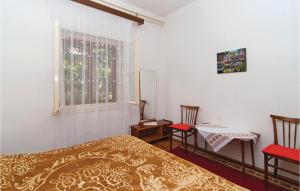 Postel nebo postele na pokoji v ubytování Apartment Supetar 49 + 8 fotografií