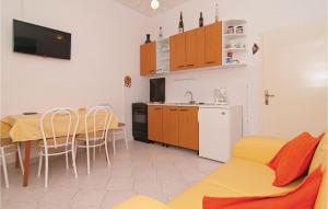 Kuchyň nebo kuchyňský kout v ubytování Apartment Supetar 49