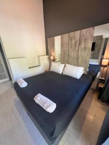 Кровать или кровати в номере Hotel Posada del Ángel