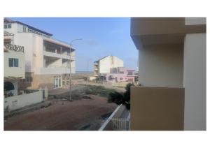 Budova, kde se apartmán nachází + 5 fotografií