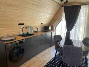 Kuchyň nebo kuchyňský kout v ubytování Apex Cottages + 21 fotografií