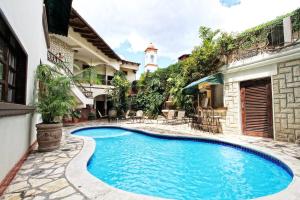 Бассейн в Hotel Plaza Copan или поблизости