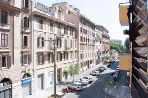 a view of a street with cars parked on the street at Shangrila in Rome