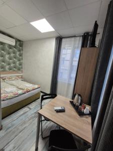 Ένα ή περισσότερα κρεβάτια σε δωμάτιο στο Guest House "The House" Топ Център Габрово