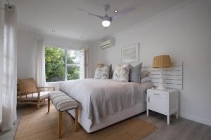 Ένα ή περισσότερα κρεβάτια σε δωμάτιο στο Stableford Beachhouse Top b&b +20 φωτογραφίες