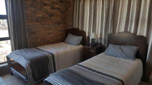 Ένα ή περισσότερα κρεβάτια σε δωμάτιο στο Alikreukel