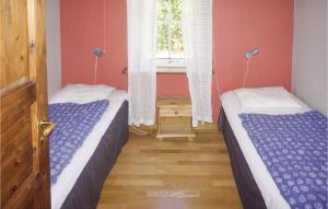 Postel nebo postele na pokoji v ubytování 3 Bedroom Lovely Home In Gällstad