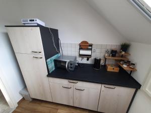 Kuchyň nebo kuchyňský kout v ubytování Gästewohnung Elbblick Zeithain