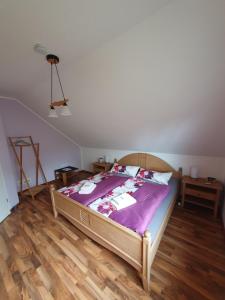 Postel nebo postele na pokoji v ubytování Gästewohnung Elbblick Zeithain