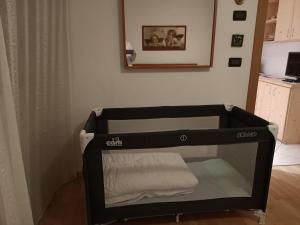 Postel nebo postele na pokoji v ubytování Andalo 2000