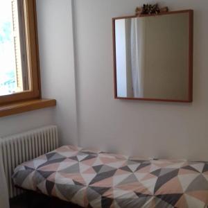 Postel nebo postele na pokoji v ubytování Andalo 2000
