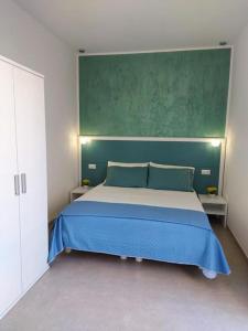 Postel nebo postele na pokoji v ubytování B&B - Over the top - Affittacamere