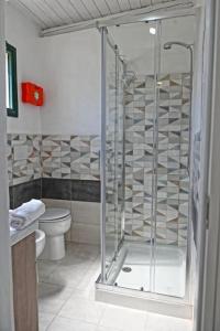 ノートにあるDuomo Roomのシャワーとトイレ付きのバスルーム
