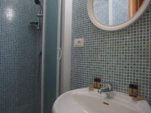 Koupelna v ubytování Hotel Genzianella