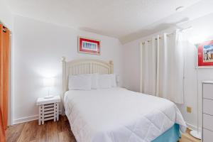 Ένα ή περισσότερα κρεβάτια σε δωμάτιο στο Myrtle Beach Resort B-446 +27 φωτογραφίες