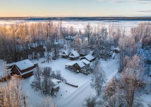 an aerial view of a village covered in snow at Downtown Talkeetna Cabin! Chulitna Cabin in Talkeetna