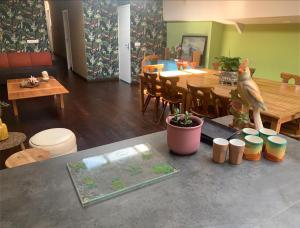 a bird statue sitting on a table in a living room at Hotelschip Bracksand Amsterdam City, in de zomer én de winter! in Amsterdam +25 photos