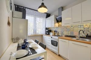 Kuchyňa alebo kuchynka v ubytovaní Apartament Dzień Dobry 2
