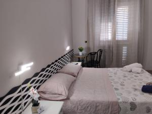 A bed or beds in a room at Al Duomo