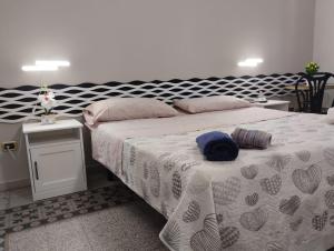 A bed or beds in a room at Al Duomo
