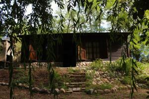 a house with a staircase in front of it at Uco Slow in Tunuyán