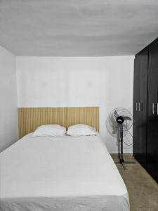 Ένα ή περισσότερα κρεβάτια σε δωμάτιο στο Denier House Guabinal 203