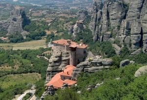 a house on the side of a mountain at ESTELA House in Ágios Vissaríon