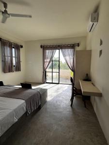 Postel nebo postele na pokoji v ubytování Boutique Hotel EL NIDO Holbox + 37 fotografií