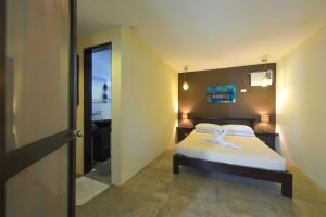 Letto o letti in una camera di Lazy Dog Bed & Breakfast