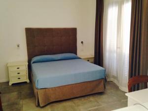 Postel nebo postele na pokoji v ubytování Moresco Resort