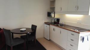 Cucina o angolo cottura di Cedar Grove Motor Lodge