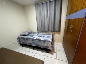 Ένα ή περισσότερα κρεβάτια σε δωμάτιο στο Apartamento Tenório dois quartos +5 φωτογραφίες