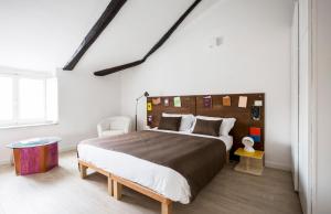 Ένα ή περισσότερα κρεβάτια σε δωμάτιο στο TorinoToStay Apartments