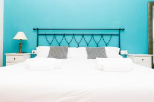 Posteľ alebo postele v izbe v ubytovaní Apartment Bright Sagrada Familia