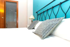 Posteľ alebo postele v izbe v ubytovaní Apartment Bright Sagrada Familia