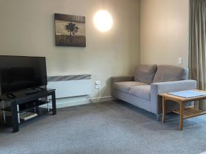Posezení v ubytování Allan Court Motel