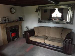 A seating area at Thatched Cottage 